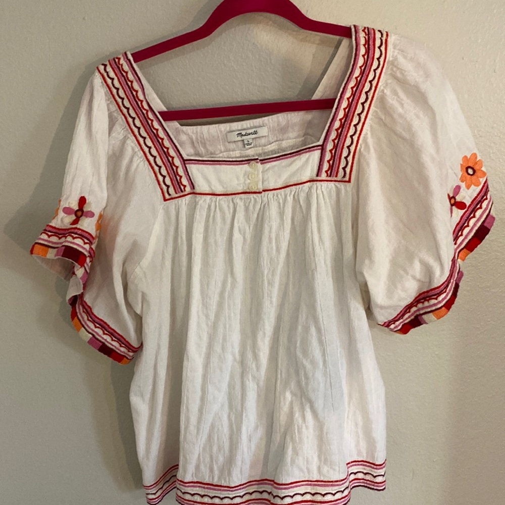 Embroidered peasant style top